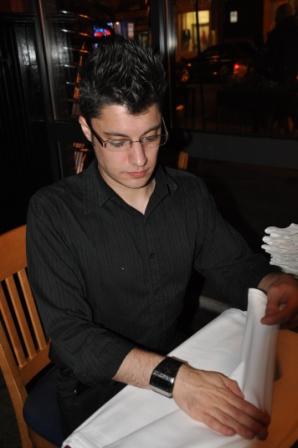 Rob has to fold 40 napkins before leaving (Photo: Reed)